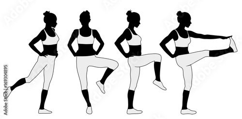 Silhouette of woman warming up her legs for fitness exercises