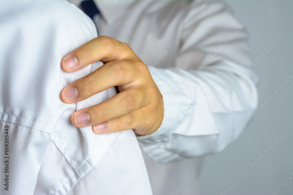 Businessman holds a hand on the shoulder of a other businessman. Businessman holds a hand on the shoulder of a other businessman.