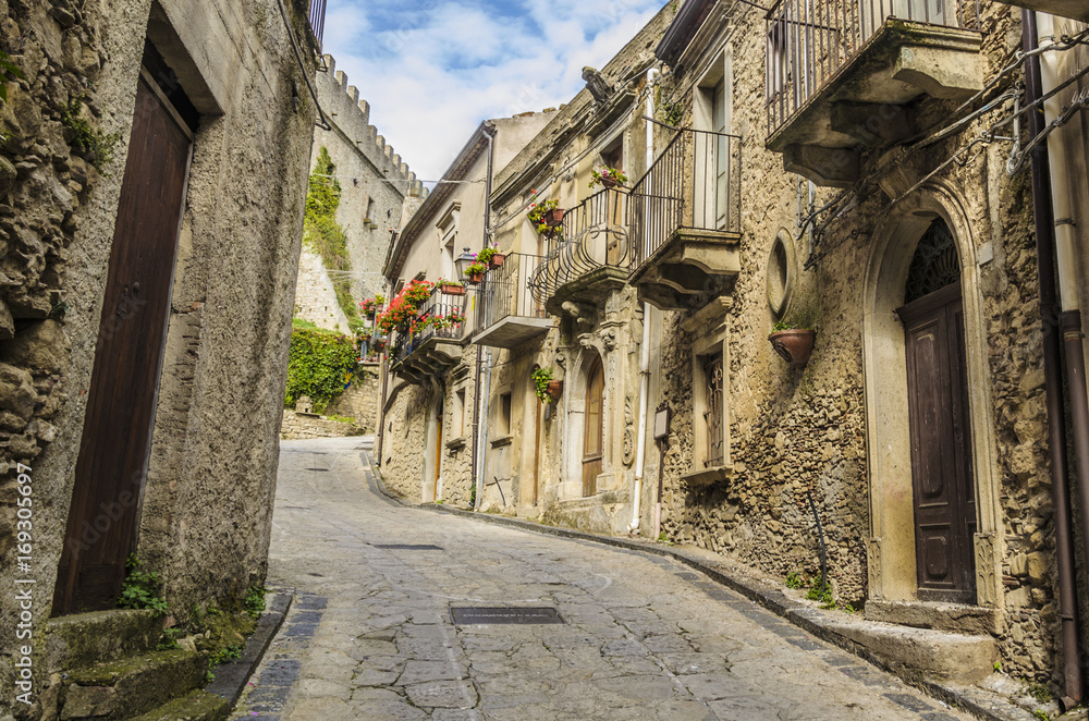 Old street of the village of montalbano elicona Italy