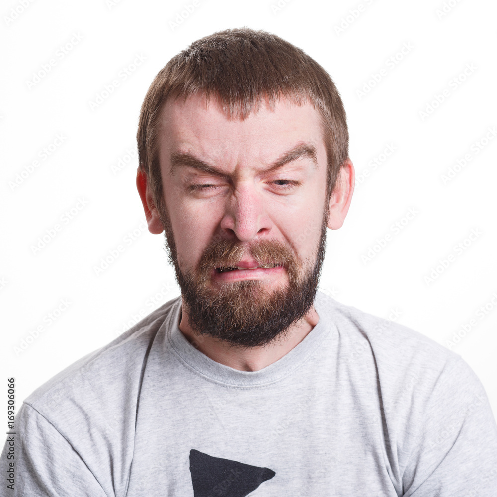 Emotions, man face expressing disgust, isolated Emotions, man face expressing disgust, isolated