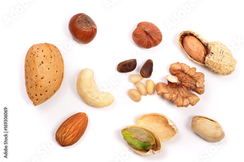mixed of nuts isolated on white background. Almonds, cashews, peanuts, hazelnuts, pine nuts, walnuts