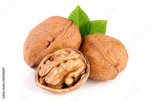 Walnuts with leaf isolated on white background