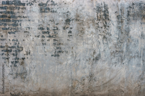Old dirty cracked gray concrete wall background. © icestylecg