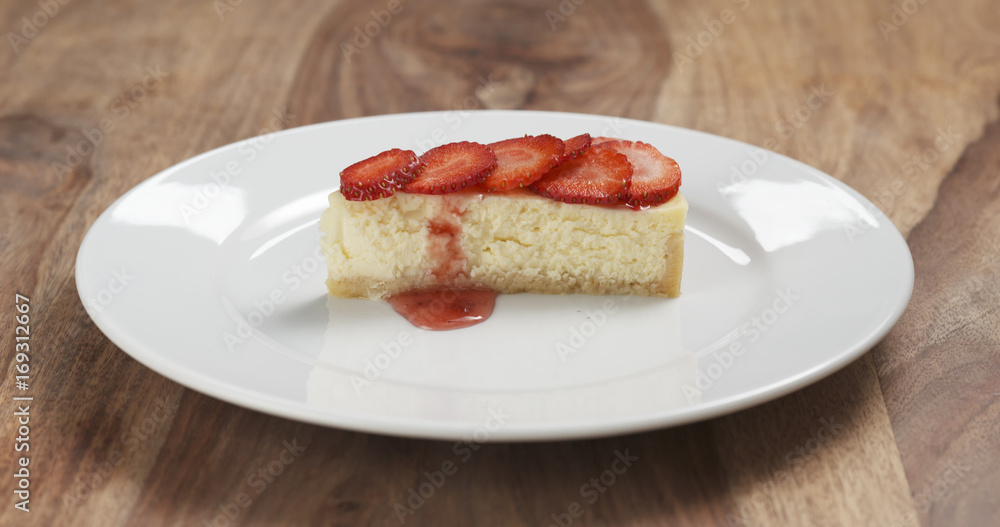 cheesecake with strawberry on plate cheesecake with strawberry on plate