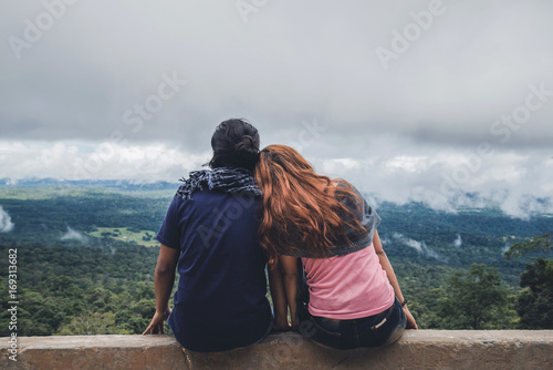 Lover women and men asians travel relax in the holiday. Take a scenic ride on the mountain. Thailand