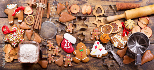 Christmas gingerbread cookies with ingredients for cooking