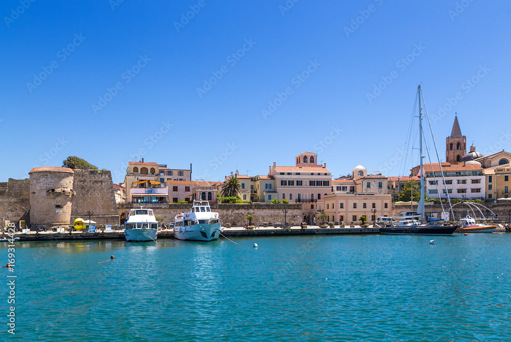 Alghero, Sardinia, Italy. Port on the background of the fortress