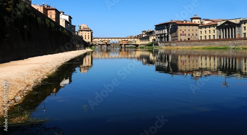 Old Bridge (Palazzo Vecchio) in Florence as seen from Arno river, Italy.