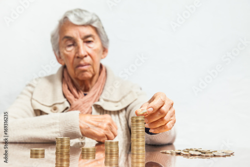 Senior woman saving money or budgeting