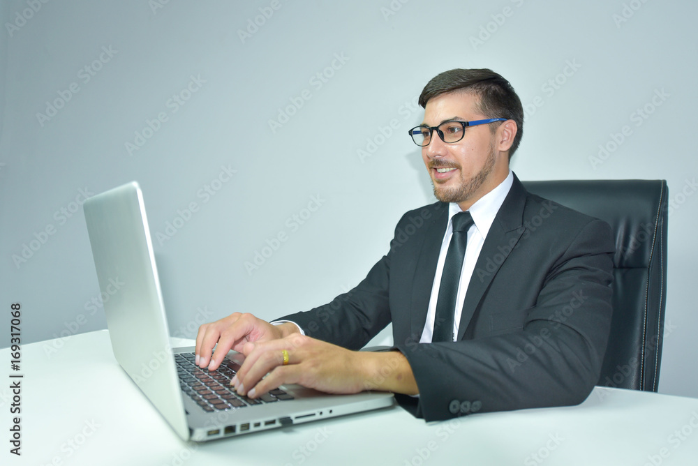 business man working with laptop. Isolated over white background business man working with laptop. Isolated over white background
