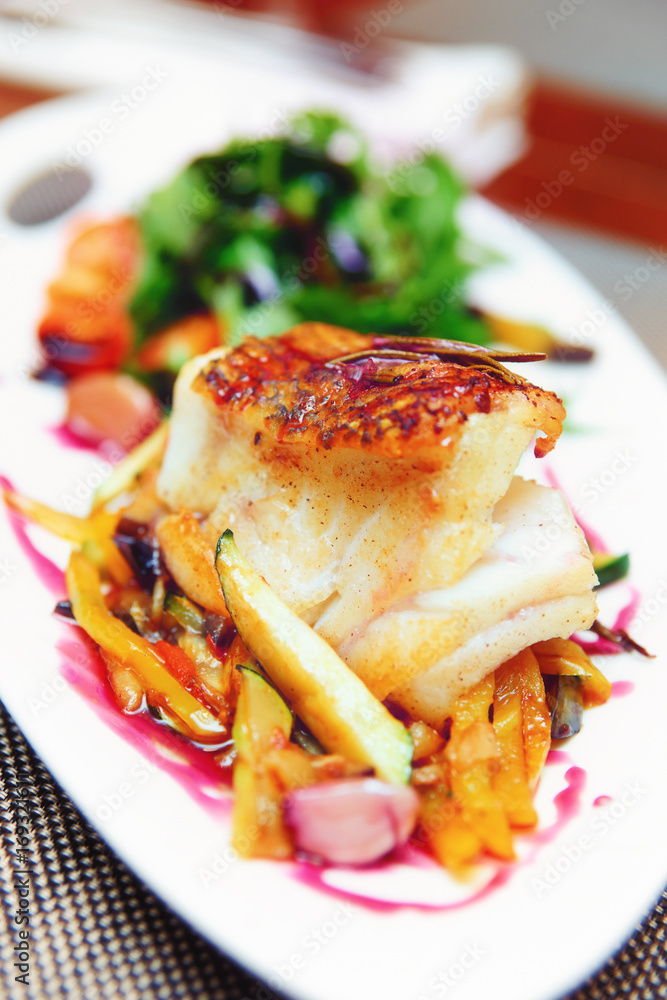 White fish fillet with vegetables, toned