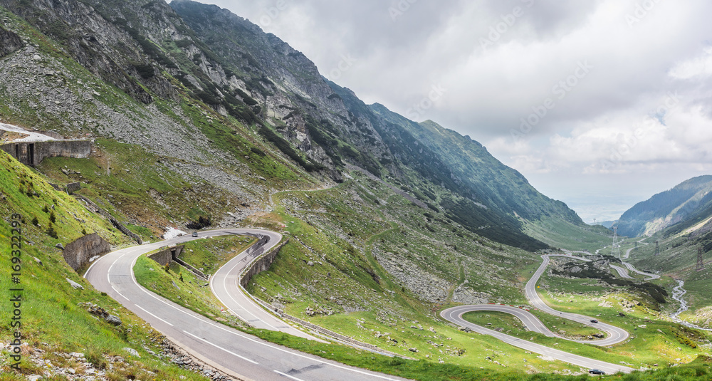 Fototapeta premium Panoramic view of the most famous and dangerous road in Europe is a Transfagarasan road in Carpathian mountains, Romania