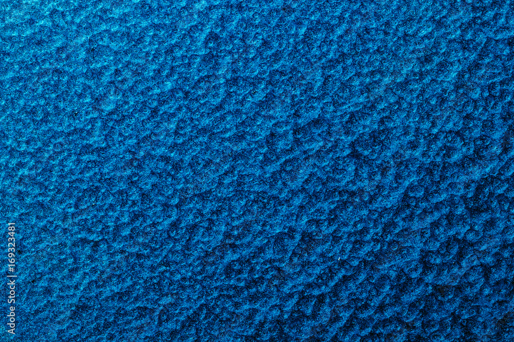 blue hammered metal background,abstract metalic texture, sheet of metal surface painted with hammer paint. blue hammered metal background,abstract metalic texture, sheet of metal surface painted with hammer paint.