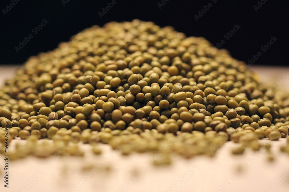 Obraz premium Heap of mung beans isolated on black