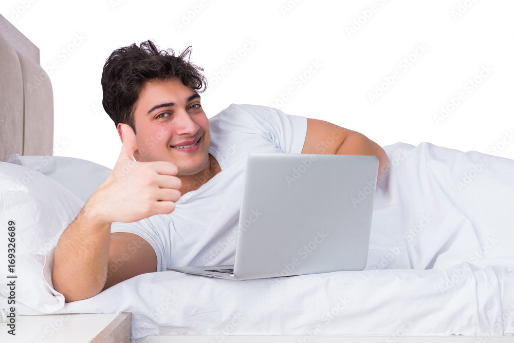 Man in bed suffering from insomnia Man in bed suffering from insomnia