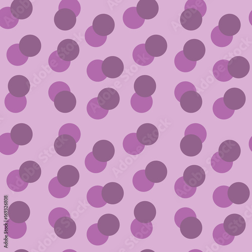 Bright purple and dark purple circles on a pale purple background