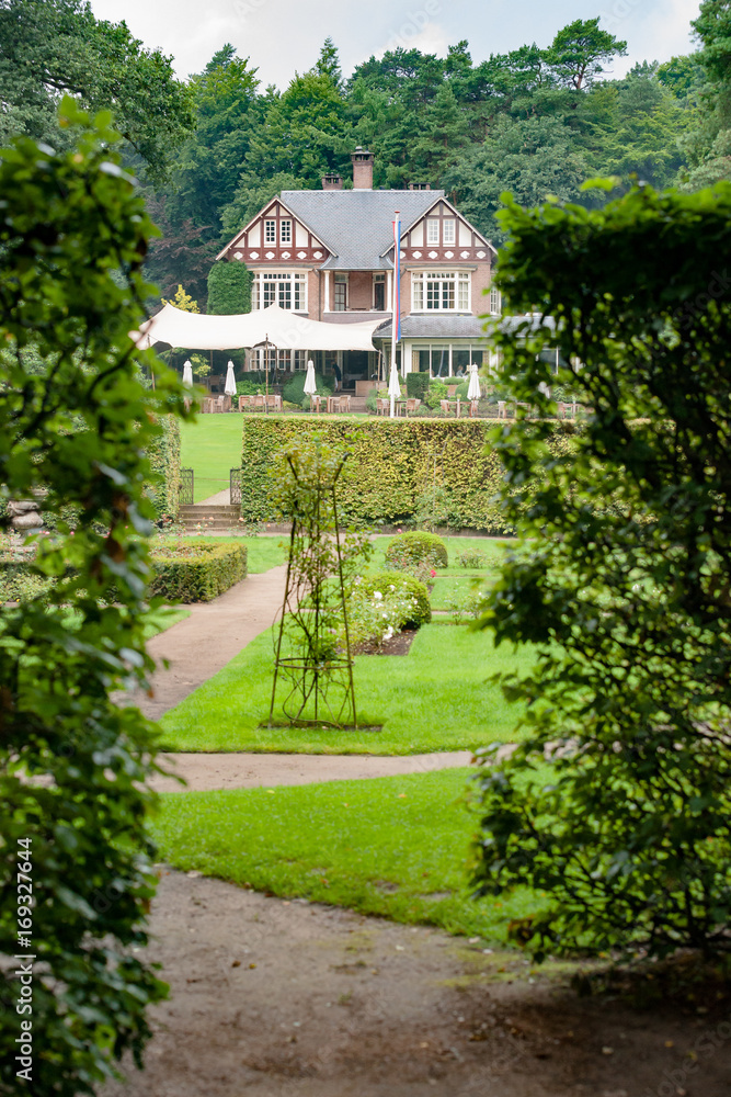 Garden and country house in the summer