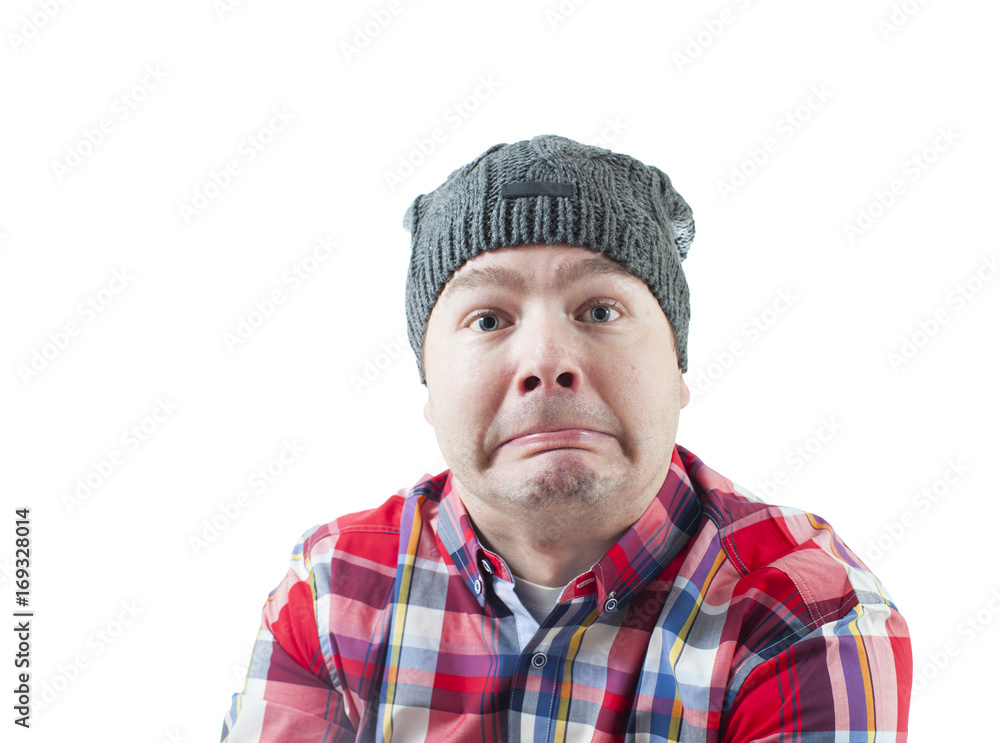 Caucasian man looking weird and funny with a hat on. The man isolated on white. Caucasian man looking weird and funny with a hat on. The man isolated on white.