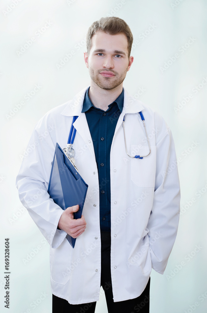 Handsome young doctor in office Handsome young doctor in office