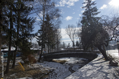 Winter view of Street in historical town of Koprivshtitsa, Sofia Region, Bulgaria