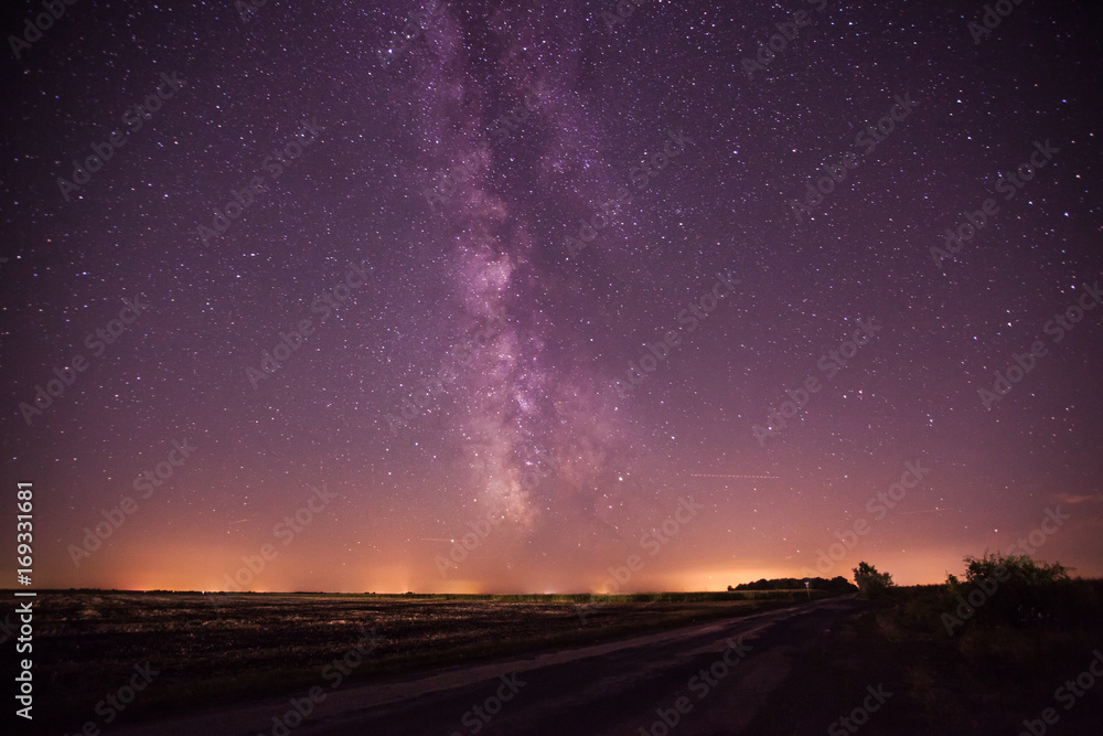 Night road at countryside under the milky way.