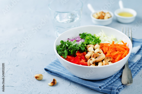 Cabbage carrot red bell pepper cashews salad