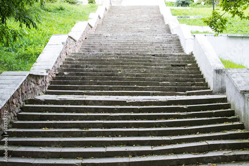 Fototapeta Naklejka Na Ścianę i Meble -  Steps of the stairs in the city park. Horizontal. Selective focus.