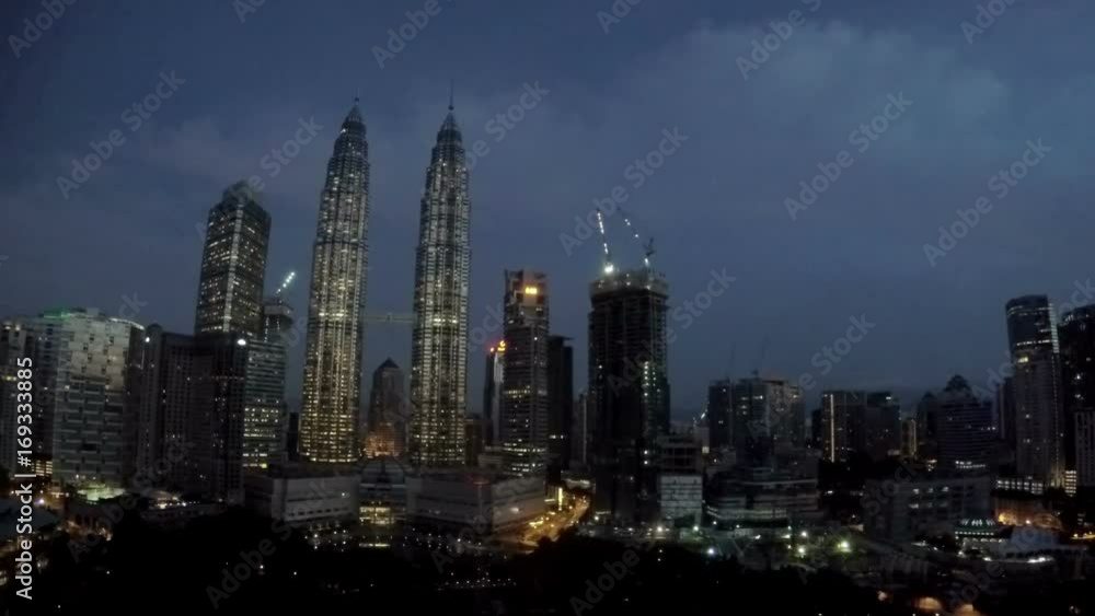 Malaysia, Kuala Lumpur the top view on the night city and the park Malaysia, Kuala Lumpur the top view on the night city and the park