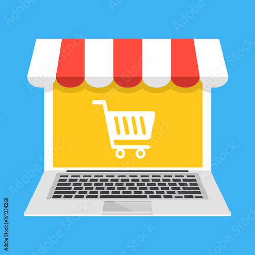 Laptop with white shopping cart icon on screen and storefront awning. E-commerce, ecommerce, online shopping, online store concepts. Modern flat design vector illustration