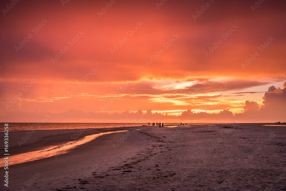 Sunset Walking down the beach Sunset Walking down the beach