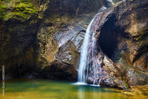 Autumnal landscape with a waterfall