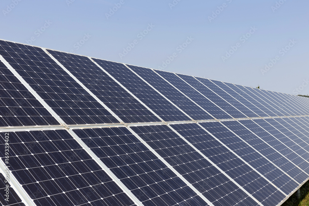 Solar Power Station on the summer flowering Meadow Solar Power Station on the summer flowering Meadow