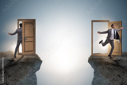 Tableau sur toile Businessman in teleportation concept with doors
