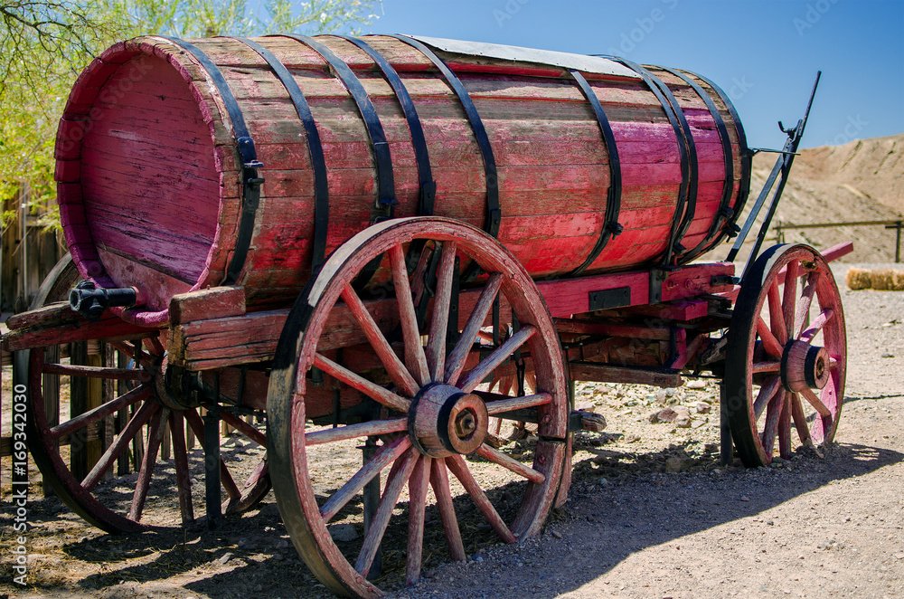 Old wooden cart with water tank