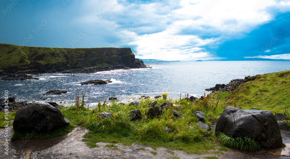 Giant's Causeway Landscape with a blue sky in summer, Co. Antrim, Northern Ireland in United Kingdom. UNESCO heritage.
