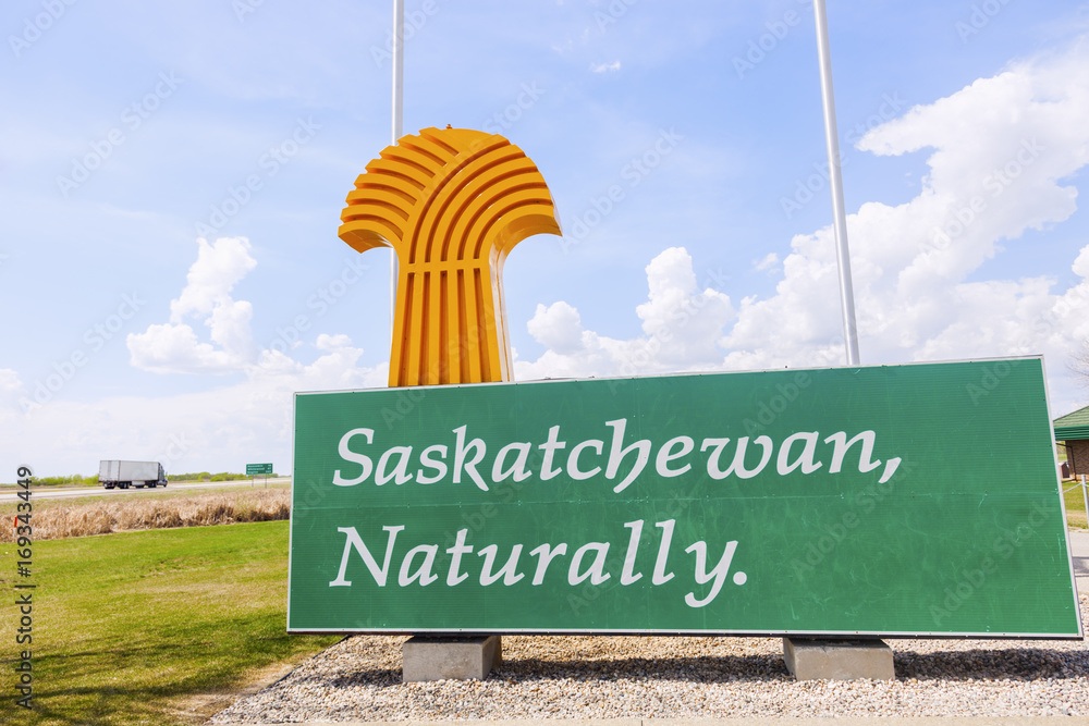 Wall Mural Welcome to Saskatchewan - sign and flags
