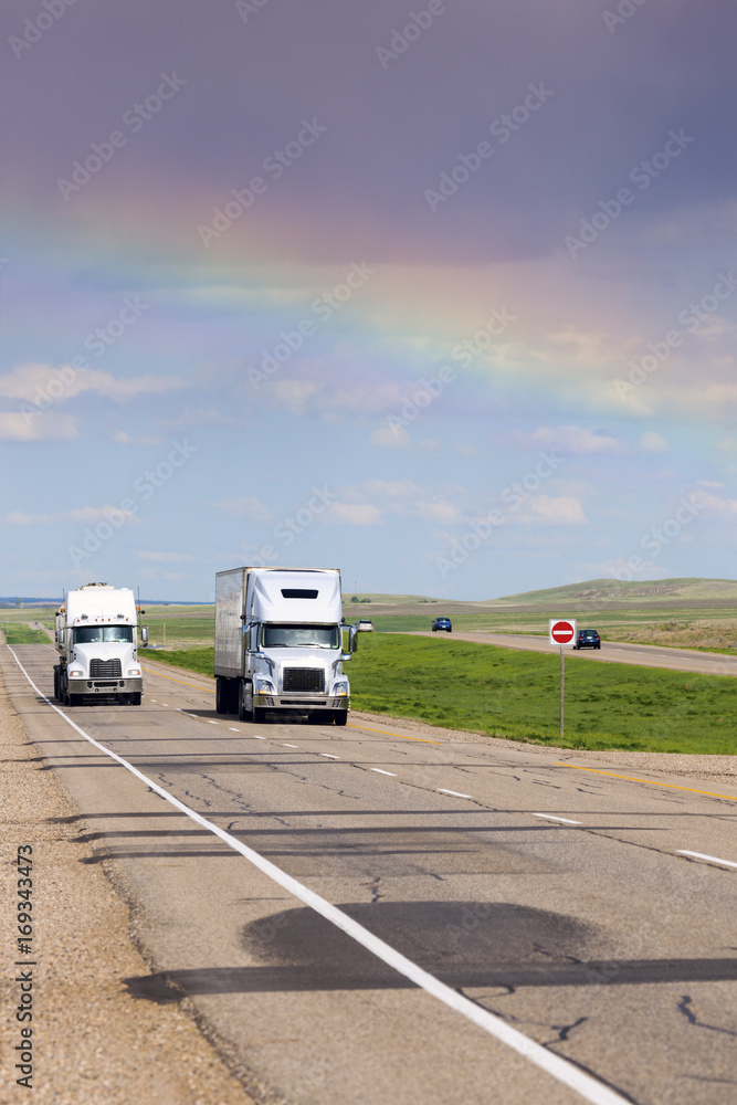 Rainbow over the highway in Saskatchewan