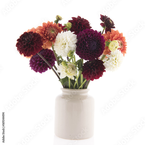Fototapeta Naklejka Na Ścianę i Meble -  Bouquet colorful Dahlias in vase