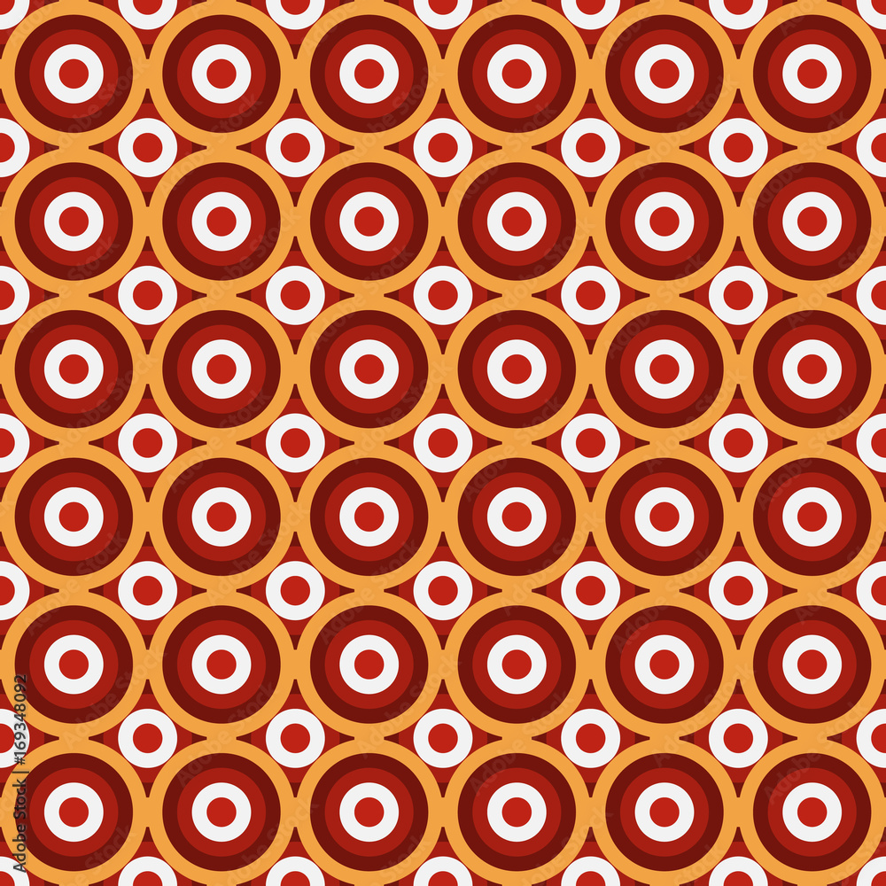 Seamless colorful pattern made by vivid circles of red, orange and white, concentric with small circles between the big ones
