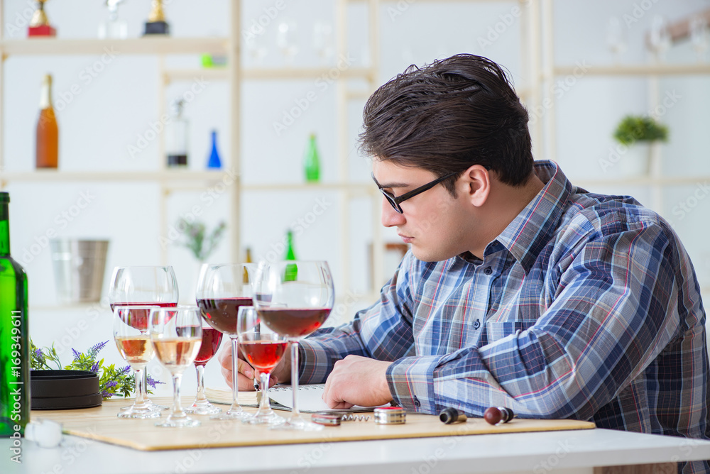 Professional sommelier tasting red wine Professional sommelier tasting red wine