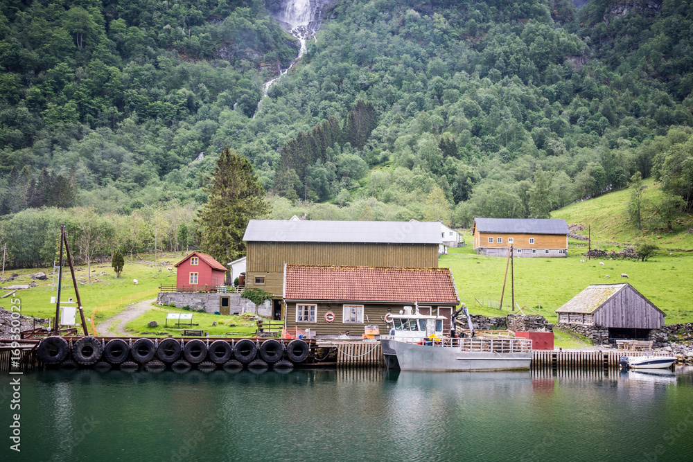 House and Boat on Fjord