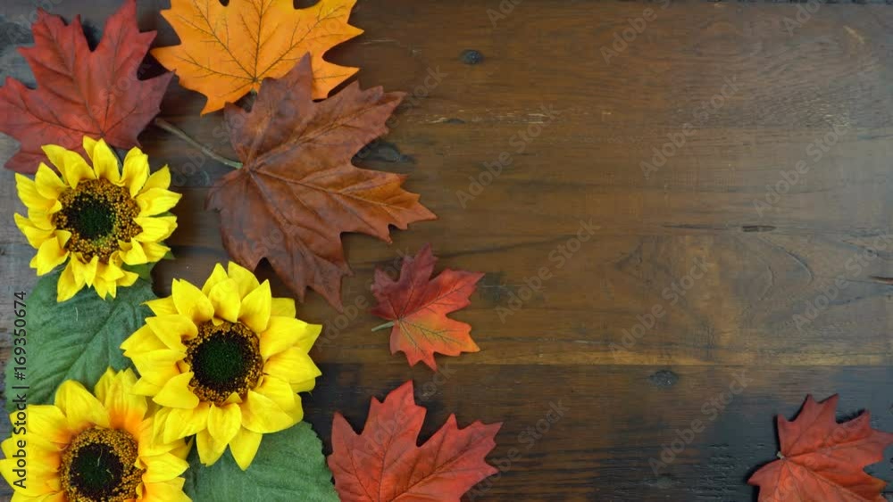 4k Autumn Fall overhead with warm woollen hat and gloves on rustic wood table background, time lapse. 4k Autumn Fall overhead with warm woollen hat and gloves on rustic wood table background, time lapse.