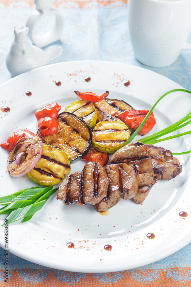 Fried meat with grilled vegetables