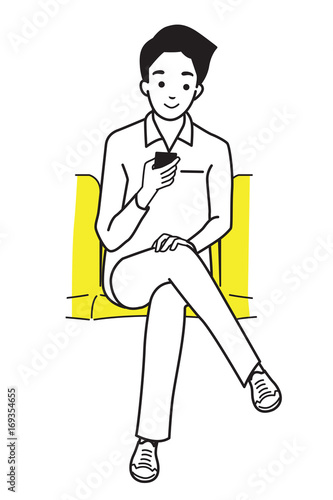 Young man using smartphone in subway