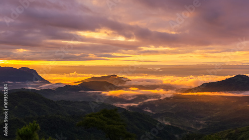 The rising sun, sky cloud sunrise abstract with mountain, background and fog