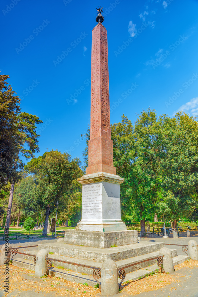 Obelisk on  Piazza Bucarest in park  near Villa Medici in Rome. Italy.
