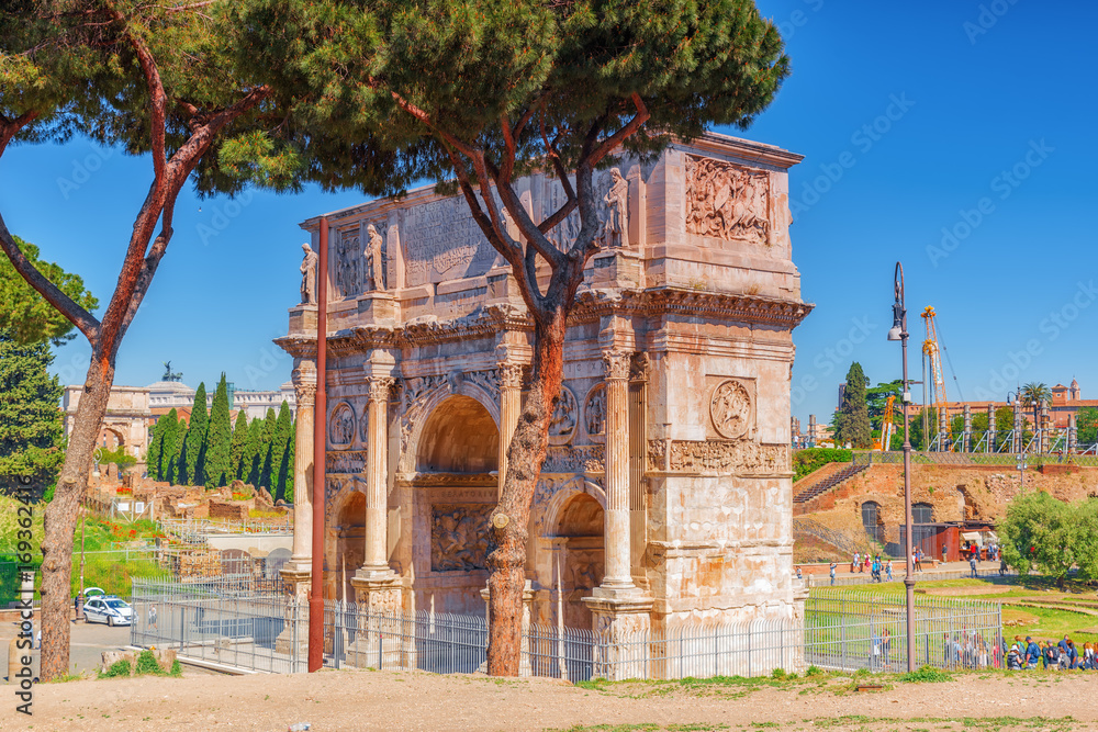 Arch of Constantine (Italian: Arco di Costantino) is a triumphal arch in Rome, situated between the Colosseum and the Palatine Hill.