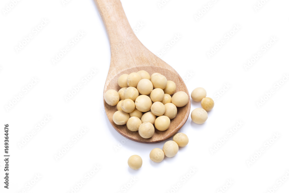 Dried soy beans in a wooden spoon. Dried soy beans in a wooden spoon.