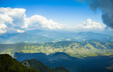 mountain valley and clouds, summer landscape in Romanian Carpathians