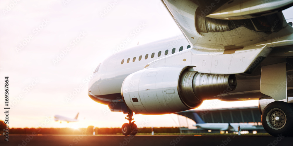Fototapeta premium White commercial airplane standing on the airport runway at sunset. Passenger airplane is taking off. Airplane concept 3D illustration.